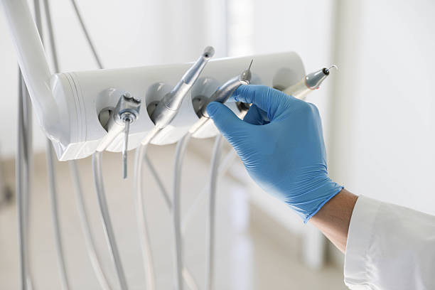 Professional Tooth Extraction technician working in Haubstadt, IN